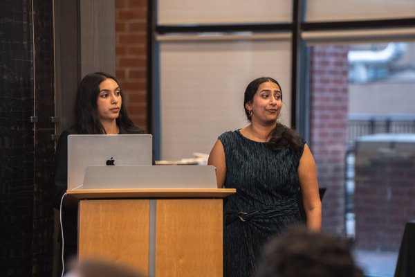 Shriya Veluri and Nanditha Niranjan at the podium together.